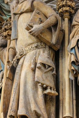 Prorok Izajasz na Studni Patrarchów w Champmol w Burgundii, 1395–1404; dupsing służy mu do powieszenia sakwy z przyborami do pisania